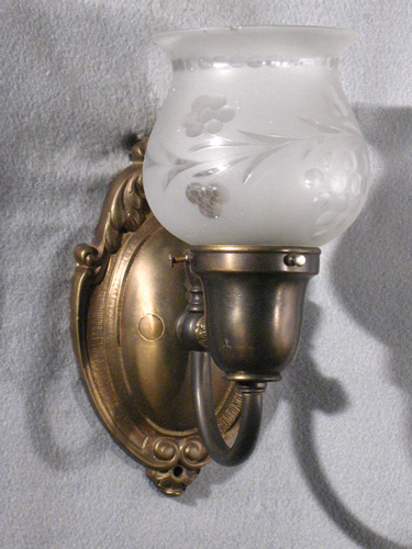 Pair of Oval Back Sconces